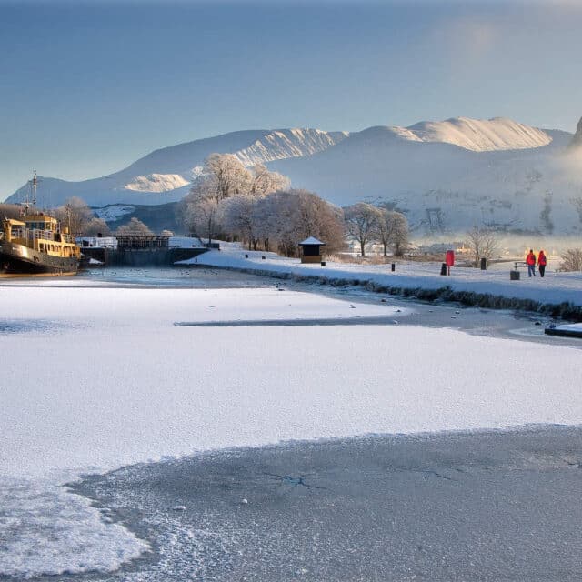 Panoramic winter scene at corpach with the ben nevis